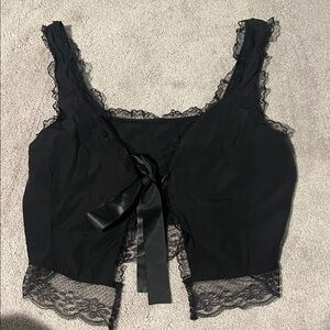 size XL black cropped tank top with tie in front and lace detail